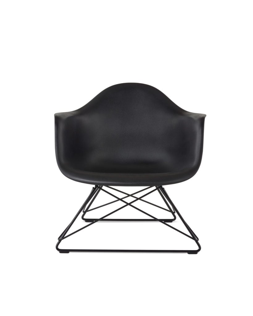black molded plastic armchair low wire base, black base