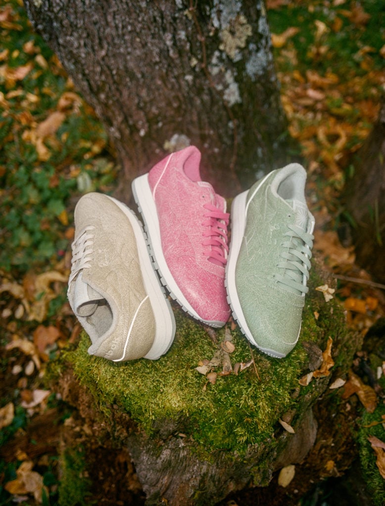 Parchment, Pink, and Seafoam Reebok x Eames Fiberglass Sneakers on a grassy backdrop